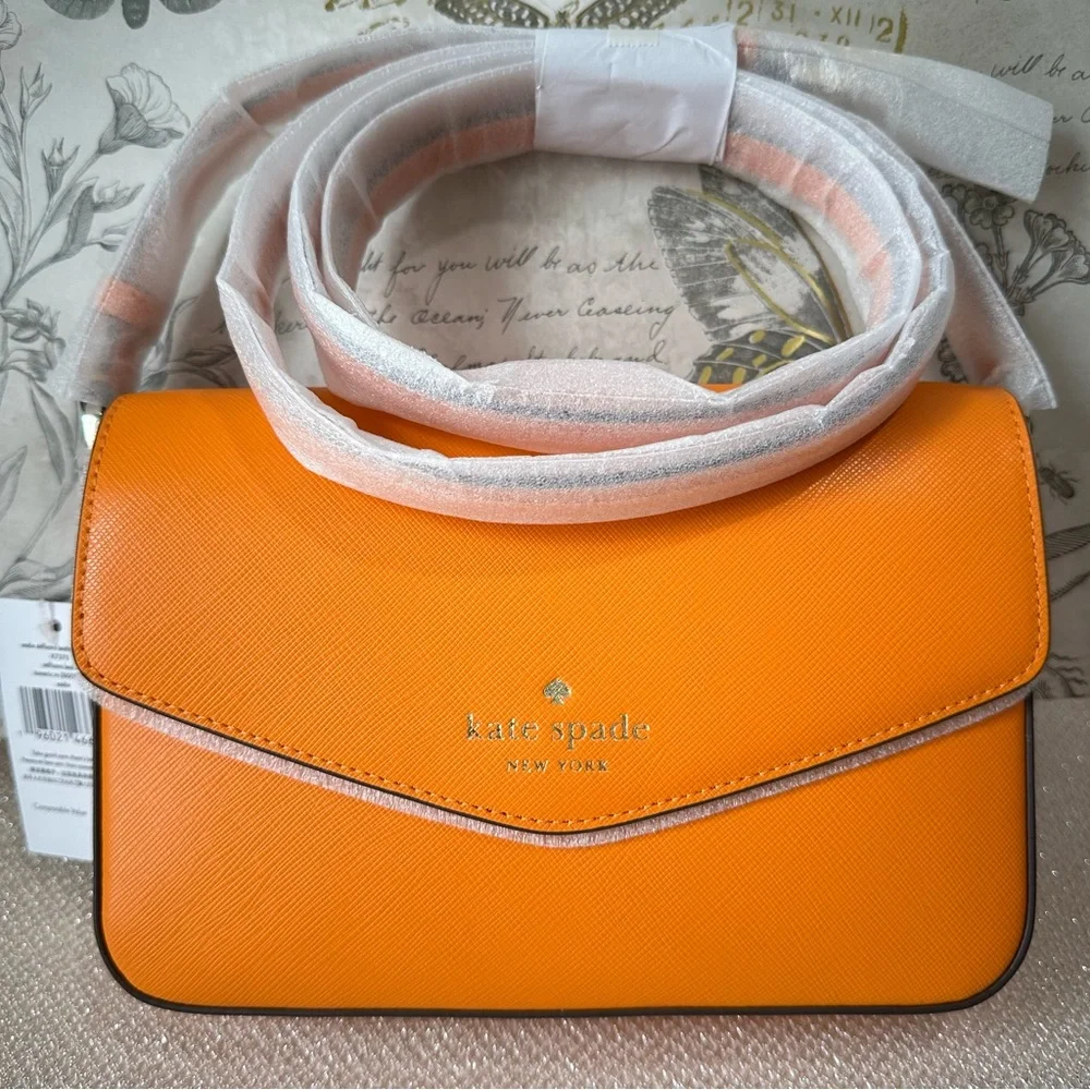 Kate Spade NY Sadie Envelope Crossbody in Turmeric Root Bright Orange K7338